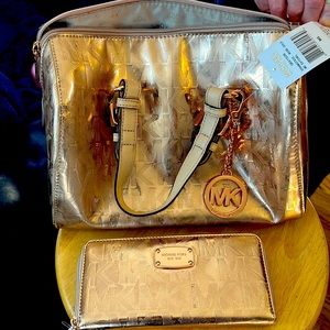 Selling the satchel and the clutch together but can be sold separately.